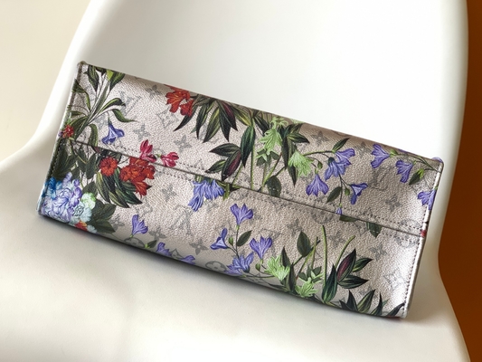 OnTheGo MM Mini Sling Bag Branded M81724 Floral Pattern Silver Coated Canvas